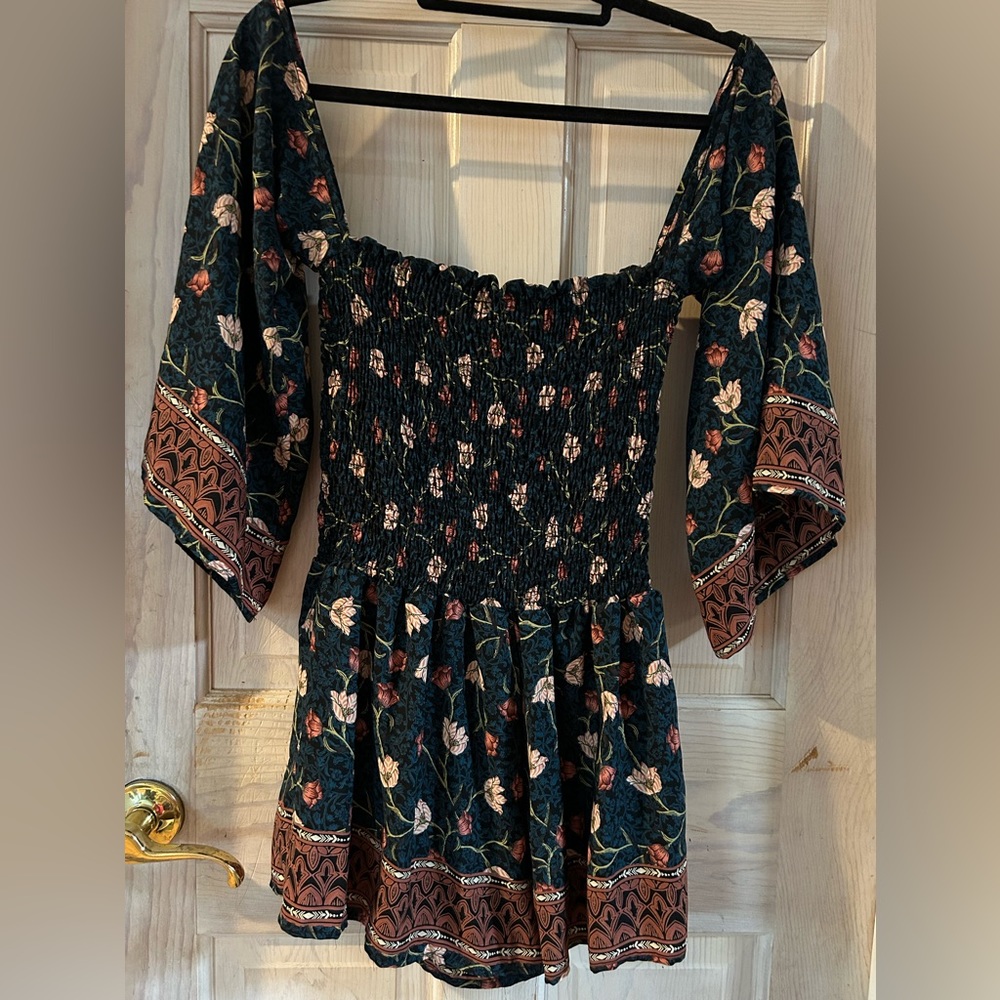Sage Smocked Off the Shoulder Floral Romper.                       Women’s Large